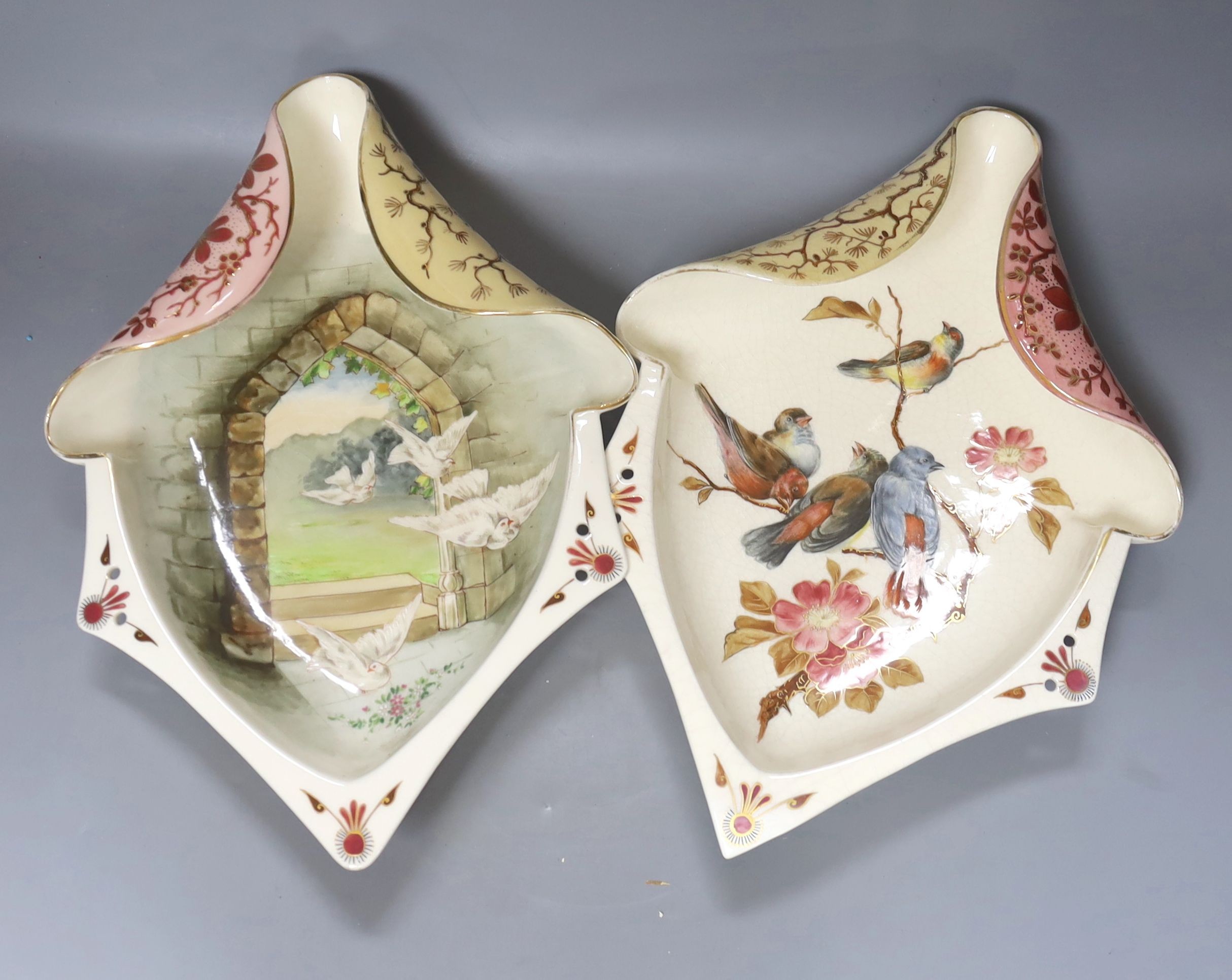 A pair of Victorian earthenware dessert dishes, decorated with birds and flowers, length 35cm